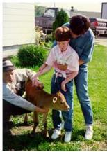 Stacey and mom with calf